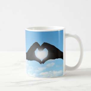 Hands in Heart Shape Silhouette on Blue Sky Coffee Mug