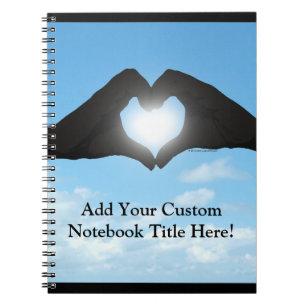 Hands in Heart Shape Silhouette on Blue Sky Notebook