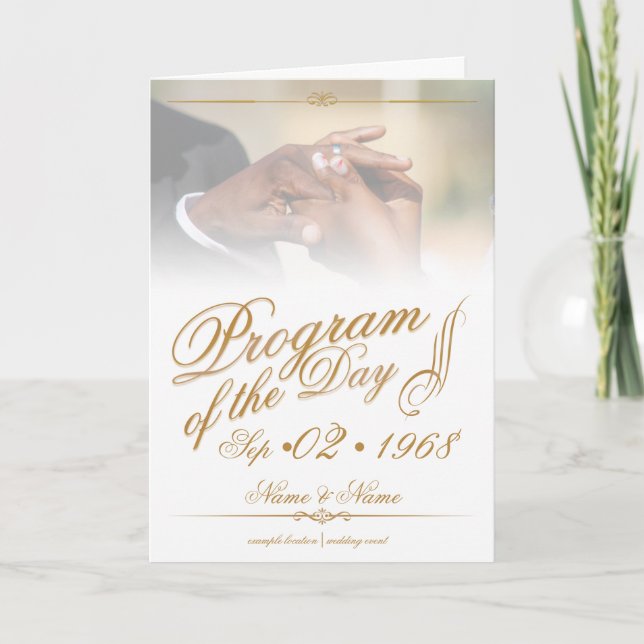 Hands of a coloured wedding couple pin on ring gol holiday card (Front)