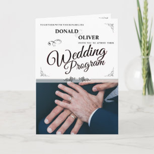 Hands Of A Gay Wedding Couple With Rings Program Card