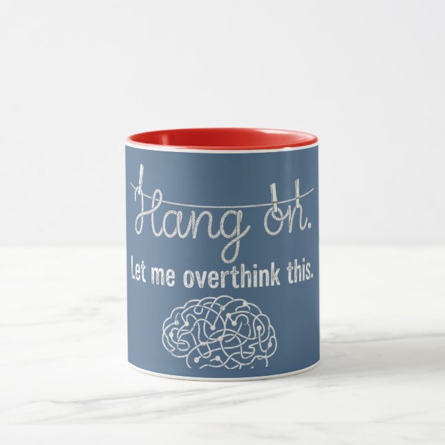 Hang on. Let me overthink this.  Mug (Center)