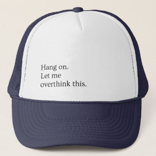 Hang on. Let me overthink this. Trucker Hat