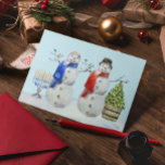 Hanukkah and Christmas Snowman Watercolor  Holiday Postcard<br><div class="desc">This design may be personalised in the area provided by changing the photo and/or text. Or it can be customised by choosing the click to customise further option and delete or change the colour of the background, add text, change the text colour or style, or delete the text for an...</div>