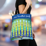 Hanukkah Blue Green Menorah Custom Name Trendy Tote Bag<br><div class="desc">A close-up photo of a bright, colourful, blue and green artsy menorah photo helps you usher in the holiday of Hanukkah in style. Feel the warmth and joy of the holiday season whenever you use this stunning, colourful Hanukkah personalised name tote bag. Matching cards, stickers, serving trays, and other products...</div>