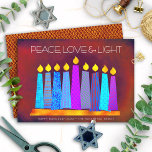 Hanukkah Boho Pattern Candles Peace Love Light Red Holiday Card<br><div class="desc">“Peace, love & light.” A playful, modern, artsy illustration of boho pattern candles in a menorah helps you usher in the holiday of Hanukkah. Assorted blue candles with colourful faux foil patterns overlay a rich deep brick red orange textured background. Faux copper diamond pattern foil on a brick red background...</div>