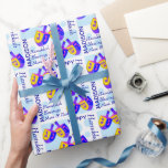 Hanukkah Dreidels Colourful Pattern Personalised Wrapping Paper<br><div class="desc">This colourful Hanukkah Dreidels pattern wrapping paper is personalised with your name and short message. Easy to customise, this one of a kind Dreidel gift wrap features my original artwork, two spinning tops in vibrant shades of blue, purple, pink and yellow for an unexpected bit of fun. Set on a...</div>