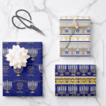 Hanukkah Gold Menorah Monogram Chic Assortment Wrapping Paper Sheet<br><div class="desc">Create your own chic custom Hanukkah wrapping paper sheets with this assortment of antique gold Menorah patterns and stripes that is easy to personalize with your monogram initial for one of a kind gift wrap. Sheet one has an allover pattern of my original faux gold Menorah artwork on a faux...</div>