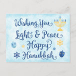 Hanukkah Light and Peace Holiday Postcard<br><div class="desc">A Jewish Hanukkah theme card with a menorah, Star of David and Driedel. The text reads Wishing You Light & Peace Happy Hanukkah. The background is a light blue watercolor wash. Personalise the back with your own message and/or company logo. These postcards are an economical way to send your holiday...</div>