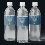 Hanukkah Love & Light Custom Blue Menorah Party Water Bottle Label<br><div class="desc">Cute custom Love and Light Hanukkah party water bottle labels for a Jewish family Chanukah dinner celebration with a synagogue. Personalise this pretty accessory with your own last name or group information in blue under the pretty gold menorah.</div>