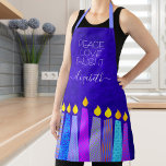 Hanukkah Menorah Candles on Blue Peace Love Light Apron<br><div class="desc">“Peace, love & light.” Here’s a wonderful way add to the fun of your holiday baking. Add extra sparkle to your holiday culinary adventures whenever you wear this stunning, colourful, custom name Hanukkah apron. A playful, artsy illustration of blue menorah candles with colourful faux foil patterns and modern typography overlay...</div>