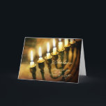 Hanukkah Menorah Lights Shalom, Peace to You Holiday Card<br><div class="desc">This Hanukkah card seems to glow with inner light as the candles on the menorah illuminate an antique book in the background. It elegantly wishes the recipient peace, "Shalom". Chanukah / Hanukkah is the perfect time of year to express your wish for peace to all your friends and loved ones,...</div>