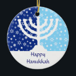 Hanukkah Menorah Ornament<br><div class="desc">The perfect ornament for the interfaith family. A Hanukkah menorah is silhouetted against a field of dark and light blue stars and snowflakes. Your personalised message goes below. Also can be used as fan, light or blind pulls or wall decor. Available with matching products.</div>