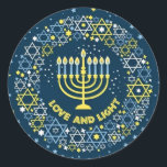 Hanukkah Menorah Star of David Wreath  Classic Round Sticker<br><div class="desc">Celebrate the beauty and warmth of Hanukkah with this elegant and modern Jewish holiday design featuring a glowing menorah surrounded by a wreath of Star of David motifs and twinkling stars. The phrase “Love and Light” captures the spirit of the Festival of Lights—joy, tradition, and togetherness. Set against a deep...</div>