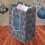 Hanukkah Rustic Menorah Blue Festival Of Lights Medium Gift Bag<br><div class="desc">A pattern of rustic faux wood menorahs and your custom text makes these personalised Hanukkah gift bags a festive choice for your Festival Of Lights celebrations. The rustic faux woodgrain menorahs repeat on a rich dark blue background while a solid deep blue oval edged in light blue holds two sets...</div>