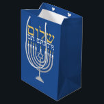Hanukkah Shalom Peace on Earth Blue Medium Gift Bag<br><div class="desc">Hanukkah Shalom Peace on Earth Blue Gift Bag for all your holiday treats. Festive Hanukkah blue with a silver menorah and gold Shalom Peace On Earth. Easy to customise with text, fonts, and colours. Created by Zazzle pro designer BK Thompson exclusively for Kate’s Creations; please contact us if you need...</div>