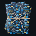 Hanukkah Symbols Blue Pattern Wrapping Paper Sheet<br><div class="desc">Celebrate the Festival of Lights with this Hanukkah-themed pattern. Featuring traditional symbols like menorahs,  dreidels,  doves,  and Stars of David,  all in vibrant blue,  gold,  and white hues,  this design is perfect for festive products. Ideal for Hanukkah wrapping paper,  greeting cards,  and other holiday decor.</div>