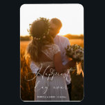 Happiest Day Ever Elegant Calligraphy Wedding  Magnet<br><div class="desc">An exquisite wedding photo magnet featuring your beautiful wedding photographs. An elegant white calligraphy overlay 'happiest day ever', embellished with decorative heart flourishes, graces the image with personalised text of the couple's name and wedding date creating a timeless and intimate feel. The text is delicately placed across the photo, and...</div>