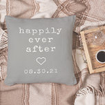 Happily Ever After | Custom Wedding Date Cushion<br><div class="desc">Create a sweet keepsake with our neutral grey pillow featuring "happily ever after" in soft ivory vintage typewriter lettering. Personalize with a wedding or anniversary date for a perfect gift for newlyweds or your favorite couple. A small heart in the center completes the design for a chic rustic farmhouse look....</div>