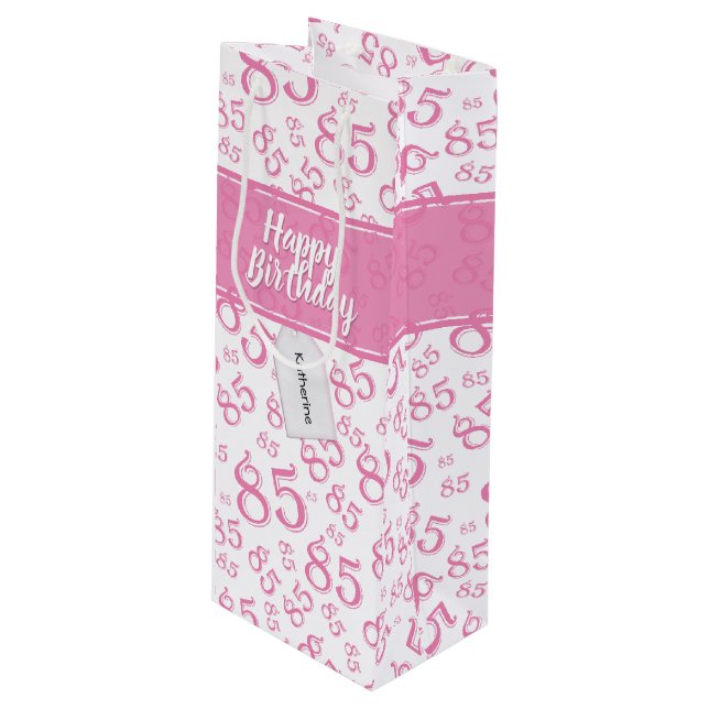 Happy 85th Birthday Number Pattern Pink/White Wine Gift Bag (Front Angled)