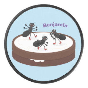 Happy ants ice skating on cookie cartoon hockey puck