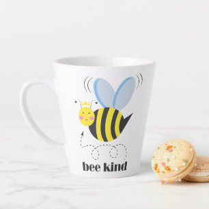 Happy bee princess with crown and slogan Bee Kind Latte Mug