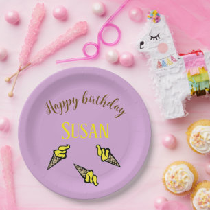 Happy birthday yellow ice cream on purple paper plate