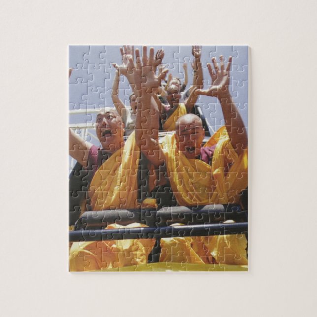 Happy buddhist monks on a roller coaster jigsaw puzzle (Vertical)