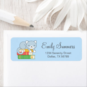 Happy Cat on top of a Book Stack on Blue