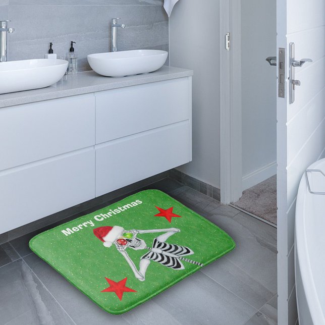 Happy Christmas Skeleton Ornament Eyes Stars Green Bath Mat (Fun Merry Christmas green bath decor on bath rug with skeleton, Santa Hat, Red Stars and ornaments.)