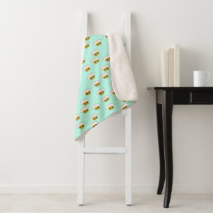Happy cupcakes on green sherpa blanket