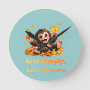 Happy Cute Monkey Playing in Falling Autumn Leaves Round Clock