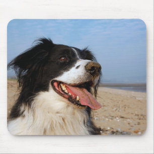 Happy dog at the beach mouse mat