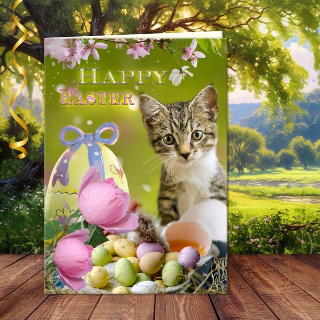 Happy Easter Cute Kitten Greeting Card (A happy Easter card featuring a cute kitten with eggs in a cheerful spring scene with pink flowers)