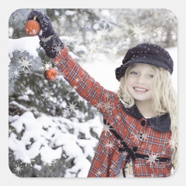 Happy girl decorating Christmas tree Square Sticker (Front)