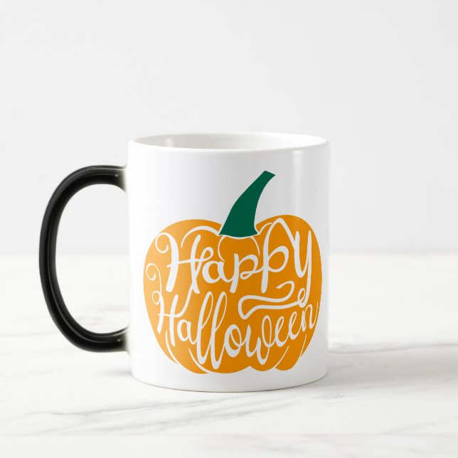 Happy Halloween lettering on carved pumpkin Magic Mug (Left)