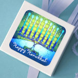 Happy Hanukkah Artsy Turquoise Blue Green Menorah Square Sticker<br><div class="desc">“Happy Hanukkah.” A close-up photo of a bright, colourful, blue artsy menorah photo helps you usher in the holiday of Hanukkah. Feel the warmth and joy of the holiday season whenever you use this stunning, colourful Hanukkah sticker. Matching cards, stamps, tote bags, serving trays, and other products are available in...</div>