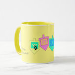 Happy Hanukkah English Hebrew Mug<br><div class="desc">There are a variety of background colours to provide either a cheery or more elegant background for the dreidel images and the Happy Hanuka greeting in both Hebrew and English. The Hebrew letters on the dreidel sides stand for: A great miracle happened here, the way the saying goes in Israel....</div>