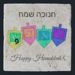 Happy Hanukkah English Hebrew Trivet<br><div class="desc">There are a variety of background colours to provide either a cheery or more elegant background for the dreidel images and the Happy Hanuka greeting in both Hebrew and English. The Hebrew letters on the dreidel sides stand for: A great miracle happened here, the way the saying goes in Israel....</div>