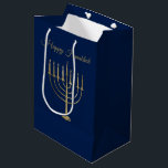 Happy Hanukkah Faux Gold Menorah Blue Holiday Medium Gift Bag<br><div class="desc">Wrap your gifts in style this holiday season with our elegant Hanukkah gift bags. This simple but chic design features a navy blue background with a large faux gold menorah in the centre. Above it reads "Happy Hanukkah". Designed by artists  © Tim Coffey and Susan Coffey.</div>