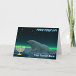 Happy Hanukkah - Ice Edge Polar Bear Holiday Card<br><div class="desc">Chanukkah greetings from the Frozen Chosen. A peaceful moment in the long Arctic night. A Polar Bear rests at the edge of an open area in the pack ice. The Northern Lights glow in the distance; bright stars twinkle overhead. A Chanukkah menorah appears along with Hebrew text reading, "חנוכה שמח...</div>