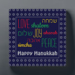 HAPPY HANUKKAH Love Joy Peace HEBREW Personalised Plaque<br><div class="desc">This is a colourful festive desktop plaque with faux silver Star of David in a subtle pattern against a deep blue background. The words LOVE JOY PEACE including their Hebrew translations are colour-coded in red, yellow and green. The text is customisable in case you wish to change anything. HAPPY HANUKKAH...</div>
