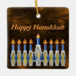 Happy Hanukkah Stylised Menorah Nebulous Sky Ceramic Ornament<br><div class="desc">This square ceramic ornament has a swirling, golden brown, nebulous background upon which is displayed a white, gold, and blue stylised menorah. In the candle flames the Hebrew characters for "Shalom" are faintly discernible, and above, the words "Happy Hanukkah" appear; the latter can be edited or removed. A warm, decorative...</div>