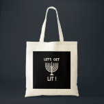 Happy Hanukkah Tis The Season Get Tote Bag<br><div class="desc">Happy Hanukkah Tis The Season Get: A joyful Hanukkah design celebrating the festival of lights. Perfect for sharing warmth and laughter. Bright,  festive,  and inclusive.</div>