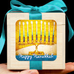 Happy Hanukkah Trendy Artsy Yellow Gold Menorah Square Sticker<br><div class="desc">"Happy Hanukkah". A close-up photo of a bright, colourful, yellow gold artsy menorah photo helps you usher in the holiday of Hanukkah. Feel the warmth and joy of the holiday season whenever you use this stunning, colourful Hanukkah sticker. Matching cards, stamps, tote bags, serving trays, and other products are available...</div>