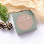 Happy Holidays & Script Family Name Christmas Classic Round Sticker<br><div class="desc">A simple boho brown Christmas sticker design with "Happy Holidays" or the greeting of your choice in sans serif capital letters. Below, your family name is printed in signature-style script handwriting. There is a minimalist horizontal line divider between the two typography sections. Ideal for sealing envelopes, decorating gift boxes, or...</div>