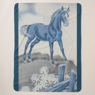 happy horse in blue sherpa blanket