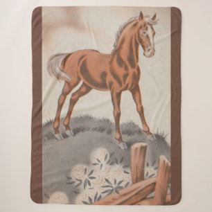 happy horse in brown sherpa blanket