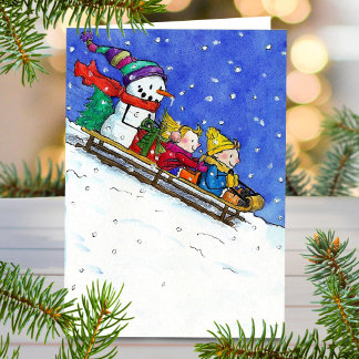 Happy kids sledging greeting card