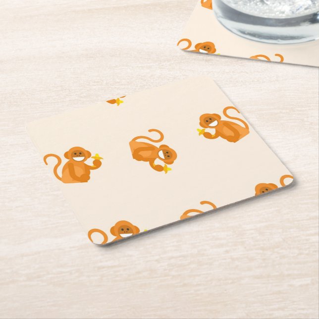 Happy monkeys eating a banana pattern square paper coaster (Angled)