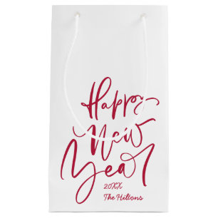 Happy new year hand lettering in red small gift bag